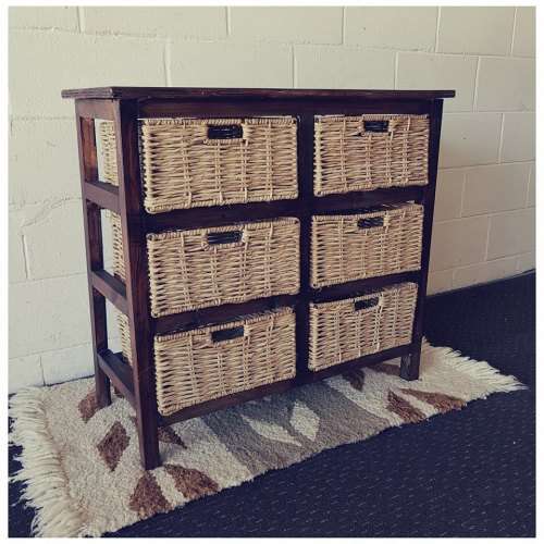 An awesome dark wooden 6-drawer cabinet with wicker drawers - great in the bathroom or bedroom!