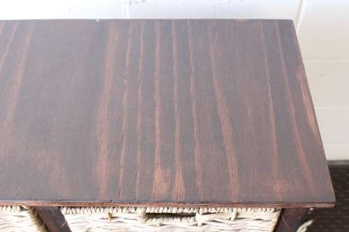 An awesome dark wooden 6-drawer cabinet with wicker drawers - great in the bathroom or bedroom!
