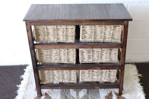 An awesome dark wooden 6-drawer cabinet with wicker drawers - great in the bathroom or bedroom!