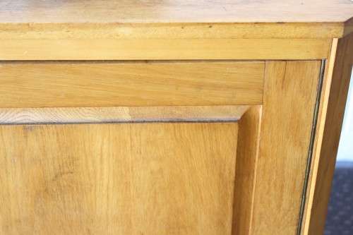 A lovely Oak single-door corner cabinet with shelves on the inside. Perfect for smaller spaces!!