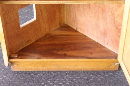 A lovely Oak single-door corner cabinet with shelves on the inside. Perfect for smaller spaces!!
