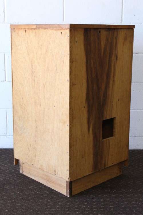 A lovely Oak single-door corner cabinet with shelves on the inside. Perfect for smaller spaces!!