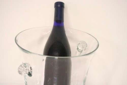 A stunning large clear glass ice bucket/ wine/champagne cooler in remarkable condition