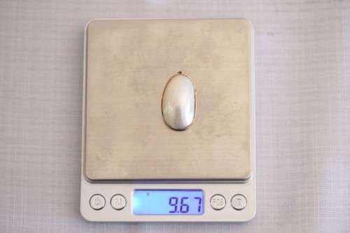 A magnificent 9ct yellow gold pendant brooch with an XL genuine Mabe pearl in superb condition
