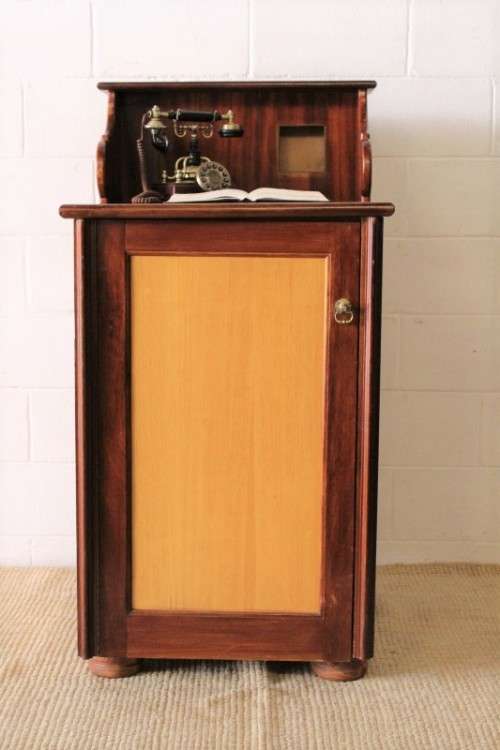 **RS17_Clearance** Yellow wood & mahogany panelled concierge pedestal w/ a large cupboard