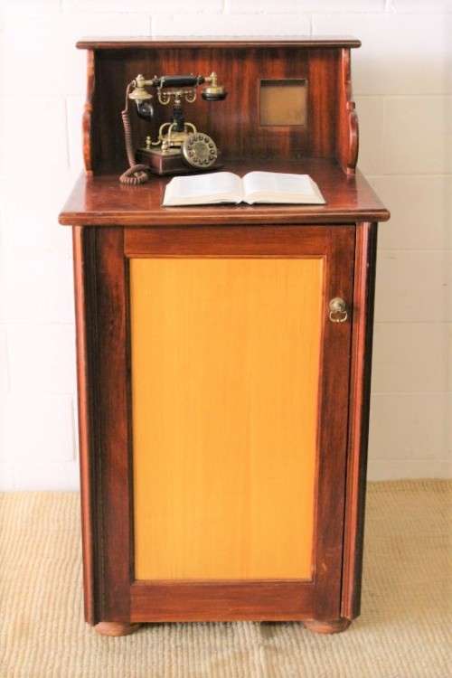 **RS17_Clearance** Yellow wood & mahogany panelled concierge pedestal w/ a large cupboard