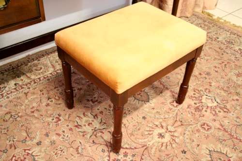 An exquisite three-drawer Imbuia dressing table with side-folding mirrors and a stool