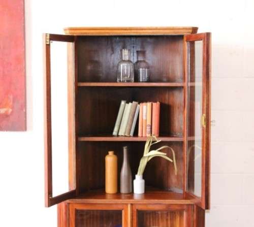 A fabulous and beautifully made 2-division corner display unit cabinet with ample shelves and space