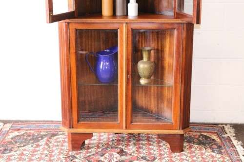 A fabulous and beautifully made 2-division corner display unit cabinet with ample shelves and space