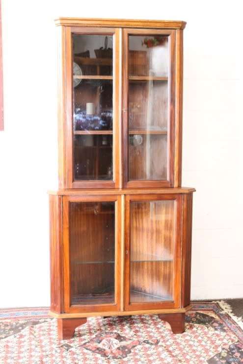A fabulous and beautifully made 2-division corner display unit cabinet with ample shelves and space