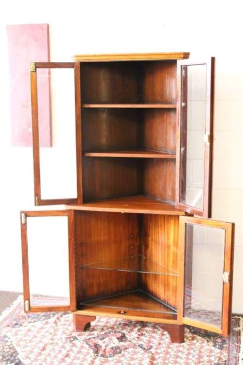 A fabulous and beautifully made 2-division corner display unit cabinet with ample shelves and space