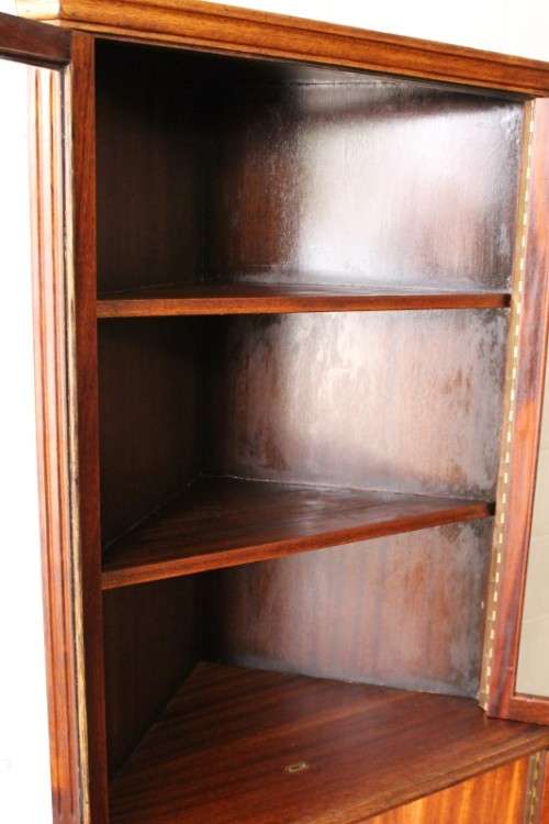 A fabulous and beautifully made 2-division corner display unit cabinet with ample shelves and space