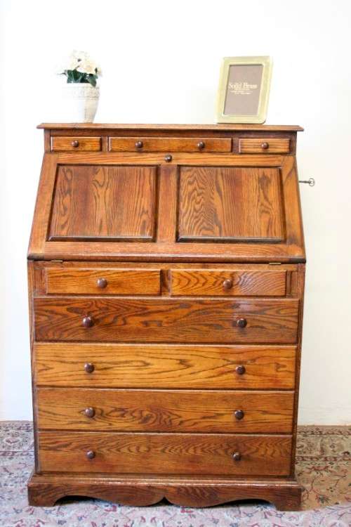 A wonderful vintage Adam Bede solid Oak fall-top writing bureau w pigeon holes and large drawers
