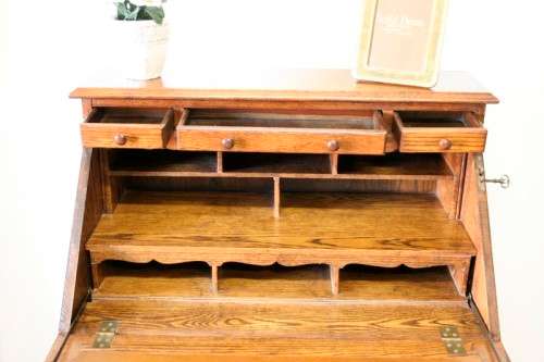 A wonderful vintage Adam Bede solid Oak fall-top writing bureau w pigeon holes and large drawers