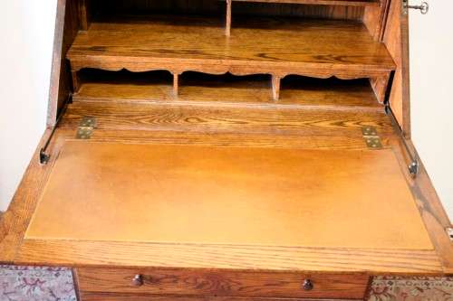 A wonderful vintage Adam Bede solid Oak fall-top writing bureau w pigeon holes and large drawers