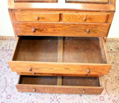 A wonderful vintage Adam Bede solid Oak fall-top writing bureau w pigeon holes and large drawers