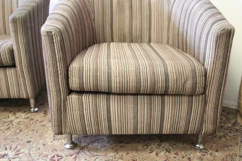 2x Stunning and very stylish upholstered tub chairs w/ clean uncomplicated lines. bid/chair