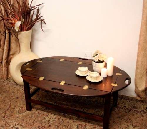 **RS17** A beautiful solid mahogany Butlers coffee table w/ drop sides and brass hinges