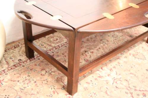**RS17** A beautiful solid mahogany Butlers coffee table w/ drop sides and brass hinges