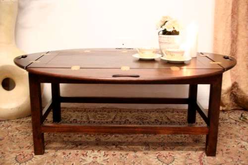 **RS17** A beautiful solid mahogany Butlers coffee table w/ drop sides and brass hinges