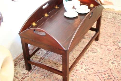 **RS17** A beautiful solid mahogany Butlers coffee table w/ drop sides and brass hinges
