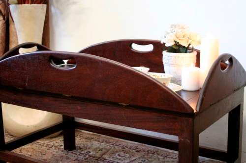 **RS17** A beautiful solid mahogany Butlers coffee table w/ drop sides and brass hinges