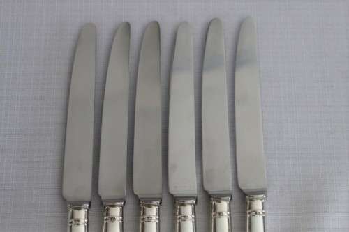 A stunning set of 6x British hallmarked sterling silver CJ Vande" dinner knives with steel blades