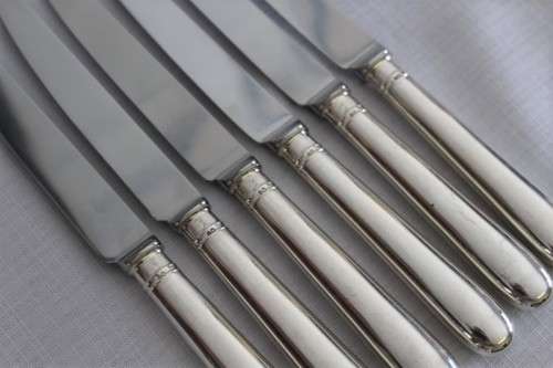 A stunning set of 6x British hallmarked sterling silver CJ Vande" dinner knives with steel blades