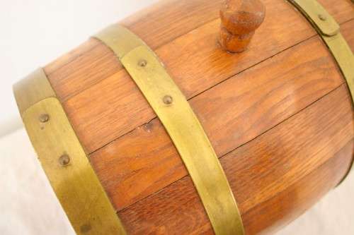 A fabulous small vintage solid Oak wine barrel with its original brass hoops, tap and stand!