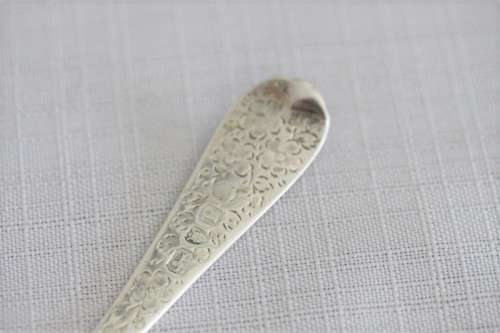 A fabulous ornate antique Georgian (1810) British made and hallmarked sterling silver spoon