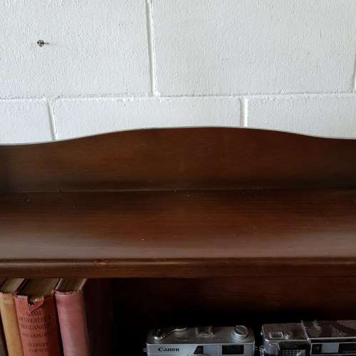 A stunning and spacious teak bookshelf with three shelves - perfect to display collectables as well!