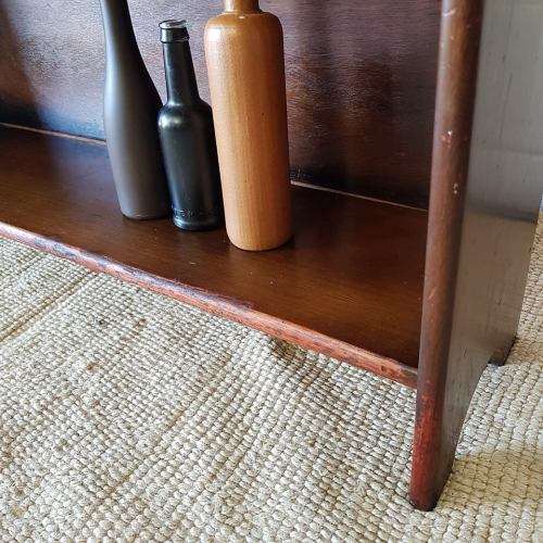 A stunning and spacious teak bookshelf with three shelves - perfect to display collectables as well!