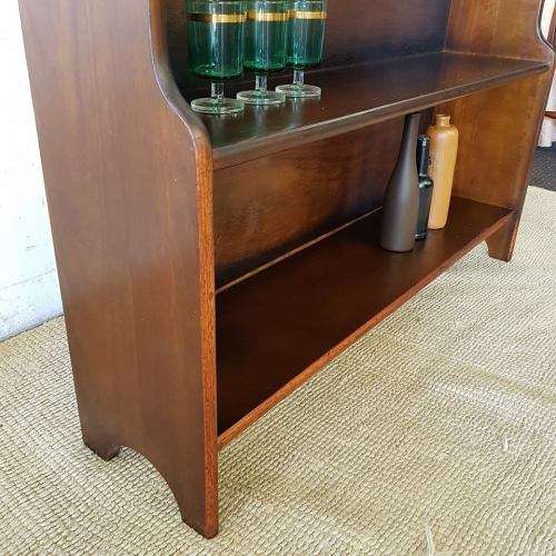 A stunning and spacious teak bookshelf with three shelves - perfect to display collectables as well!