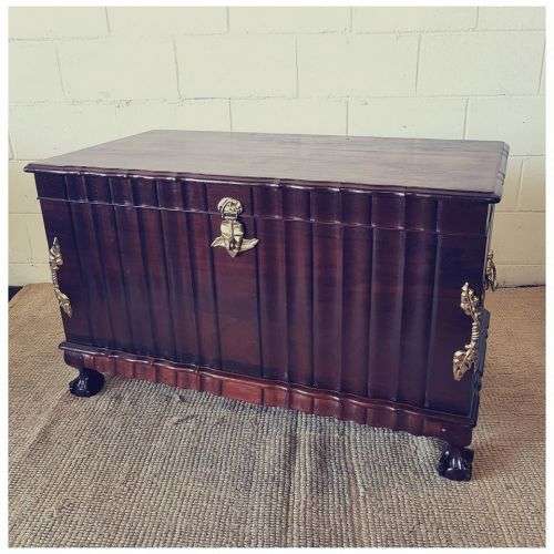 A magnificent large and HEAVY hand carved solid Imbuia ball & claw Kist with brass embellishments