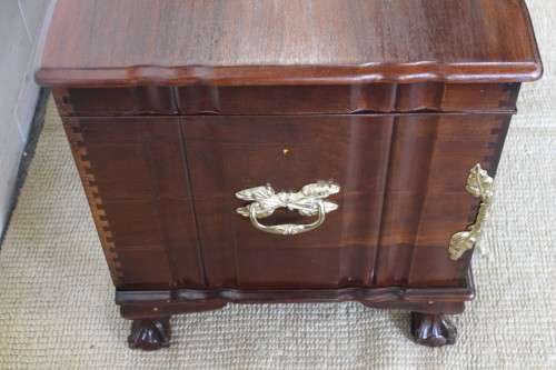 A magnificent large and HEAVY hand carved solid Imbuia ball & claw Kist with brass embellishments