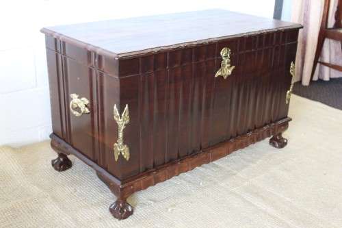 A magnificent large and HEAVY hand carved solid Imbuia ball & claw Kist with brass embellishments