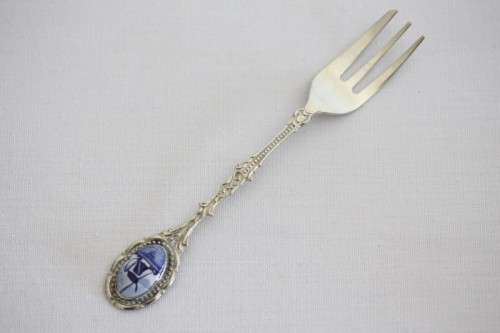An awesome boxed set of six Dutch made silver plated cake forks with blue and white decals
