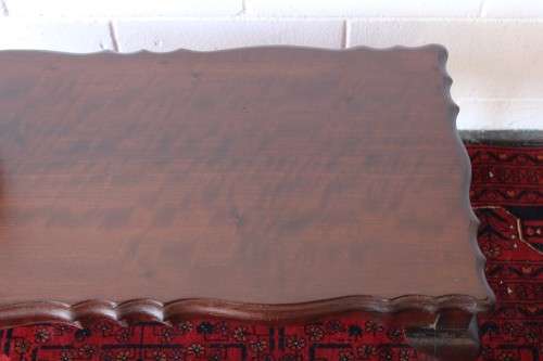 A lovely vintage Imbuia center coffee table with large ball and claw feet in great condition!!