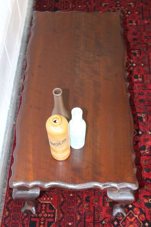 A lovely vintage Imbuia center coffee table with large ball and claw feet in great condition!!