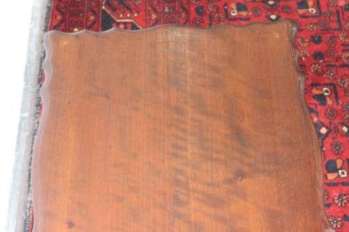 A lovely vintage Imbuia center coffee table with large ball and claw feet in great condition!!