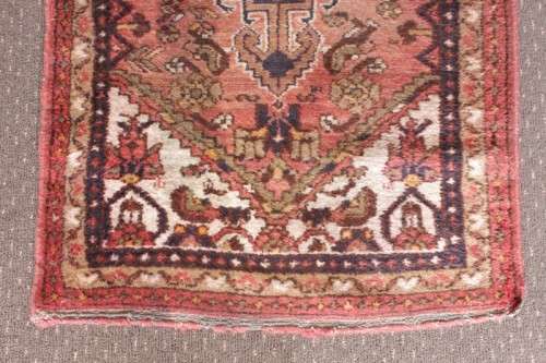 An awesome vintage/ antique? hand dyed Persian carpet (127cm x 80cm) with red and earthy tones