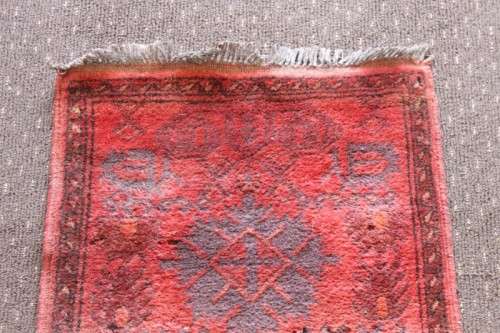 A stunning vintage traditional burgundy Afghan Persian carpet in good condition