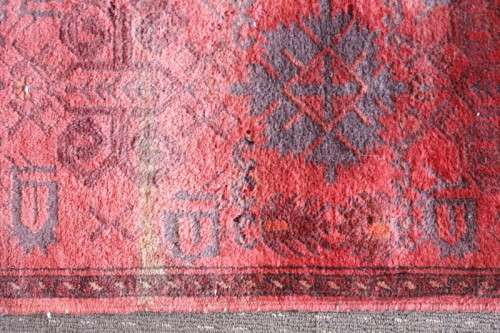 A stunning vintage traditional burgundy Afghan Persian carpet in good condition