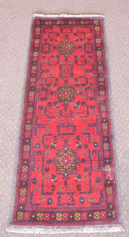 An incredible and beautifully made (154cm x 54cm) Pakistani Bokhara carpet in beautiful condition
