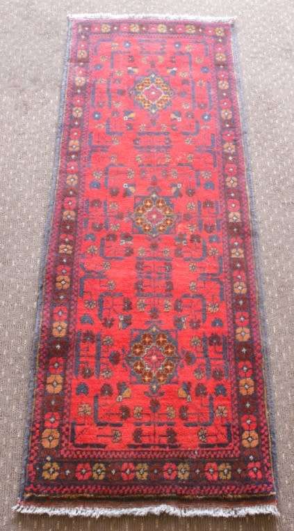 An incredible and beautifully made (154cm x 54cm) Pakistani Bokhara carpet in beautiful condition
