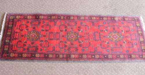 An incredible and beautifully made (154cm x 54cm) Pakistani Bokhara carpet in beautiful condition
