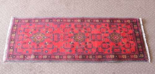 An incredible and beautifully made (154cm x 54cm) Pakistani Bokhara carpet in beautiful condition