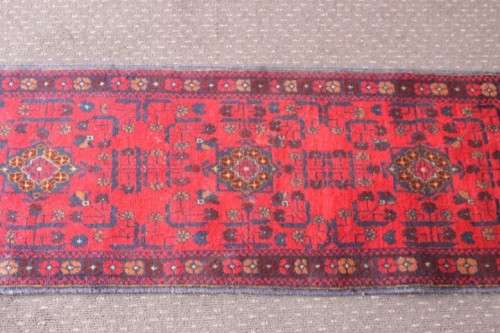 An incredible and beautifully made (154cm x 54cm) Pakistani Bokhara carpet in beautiful condition