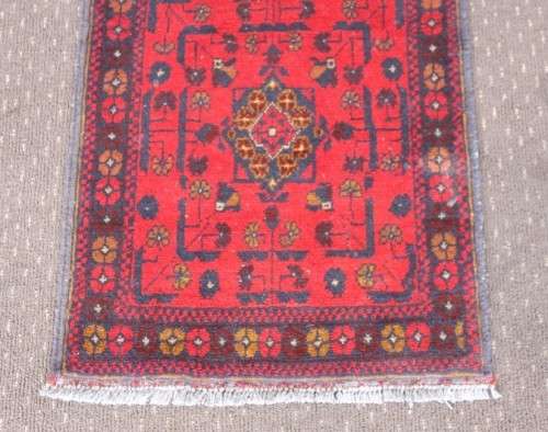 An incredible and beautifully made (154cm x 54cm) Pakistani Bokhara carpet in beautiful condition