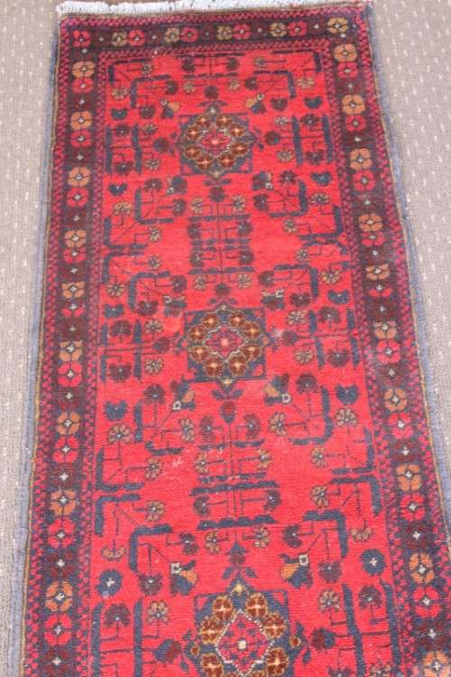 An incredible and beautifully made (154cm x 54cm) Pakistani Bokhara carpet in beautiful condition